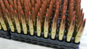 Rifle ammo 300 Blackout subsonic, sitting in a full ammo tray with bullet tips pointing up.