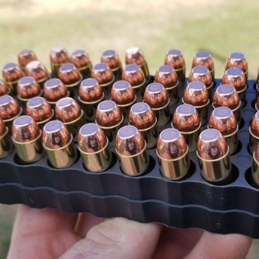 10mm Pistol ammo in a inside of an ammo tray with the points facing up.