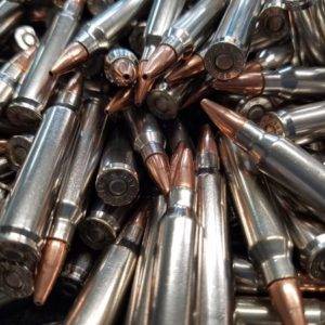 223 Rem 75 grain Boat Tail Hollow Points Remanufactured Bulk Rifle Ammo in a loose pile, manufactured by Ammo by Pistol Pete