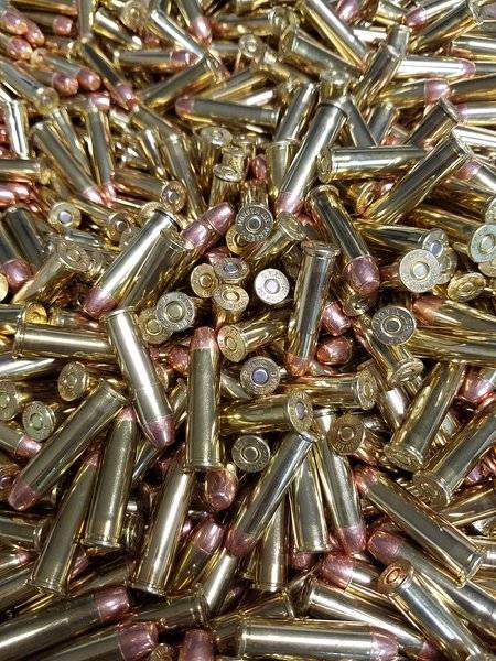 Loose pile of .357 Mag 158 grain Flat Point bulk remanufactured pistol ammunition for sale. Bulk ammo Made in the USA by Ammo by Pistol Pete