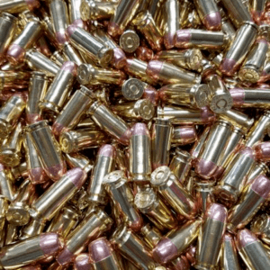 40 Caliber S&W bulk remanufactured ammo in a loose pile. Manufactured by Ammo by Pistol Pete