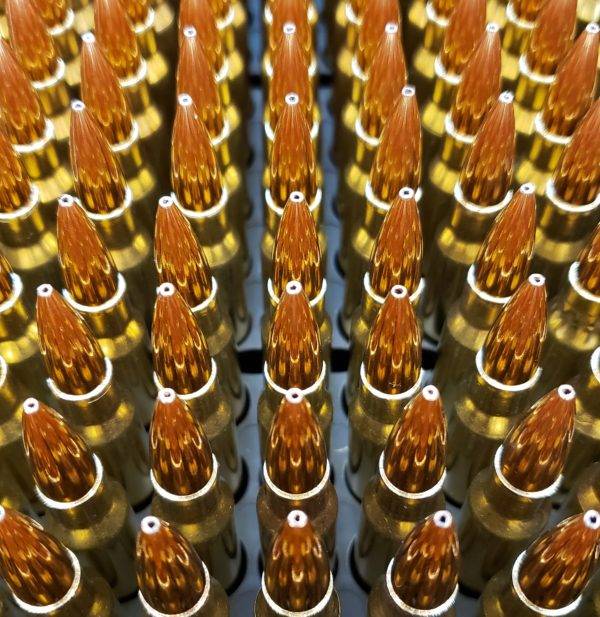 .308 Winchester Remanufactured Rifle Ammunition 168 grain hollow point ammo close up of ammo lined up in an ammo tray. Manufactured by Ammo by Pistol Pete