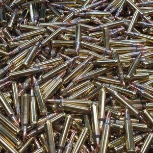 223 Rem 62 grain FMJ Target Remanufactured Bulk Rifle Ammo in a loose pile. Manufactured by Ammo by Pistol Pete