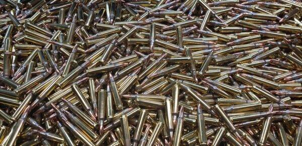223 Rem 62 grain FMJ Target Remanufactured Bulk Rifle Ammo in a loose pile. Manufactured by Ammo by Pistol Pete