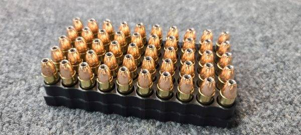 9mm 124 grain HP Remanufactured Bulk Pistol Ammo in an ammo tray. Made in the USA by Ammo by Pistol Pete.