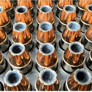 Loose 45 acp (automatic colt pistol) ammo in a pile with shiny clean shells.